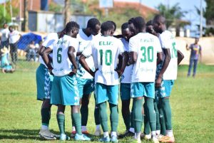KHB players discussing together at half-timt.