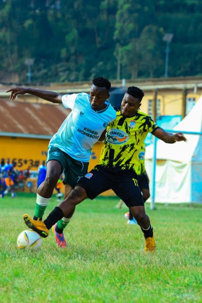 Seremba Joseph going one on one with a Booma FC player.